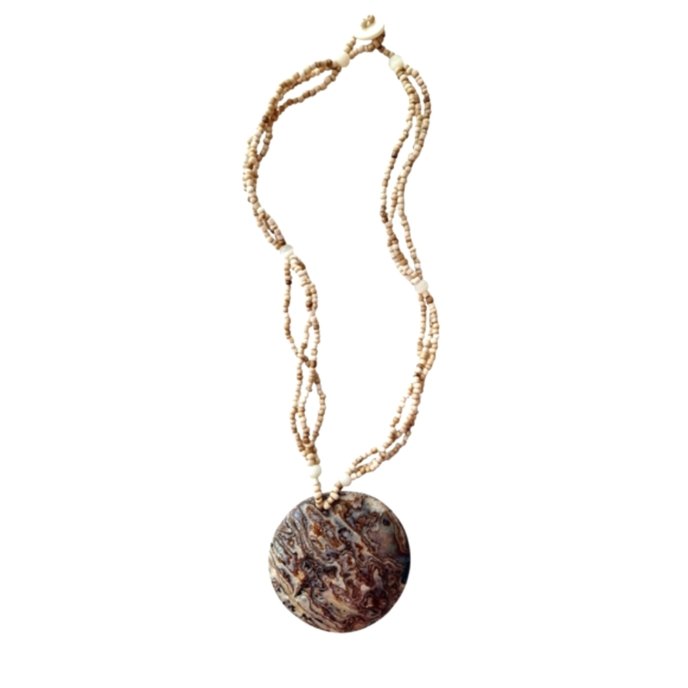 Elegant Beaded Necklace with Earthy Shell Pendant - Picture 2 of 3